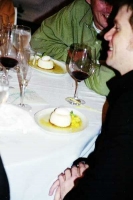 The night winds down over wine and cheesecake