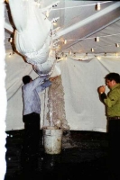 Staff members fight the onslaught of the storm