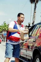 A skater sorts his trinkets