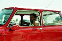 Man on phone while in parade