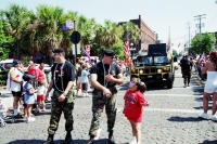 Soldiers talk with girl