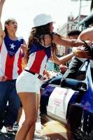 Latina is handed a trinket